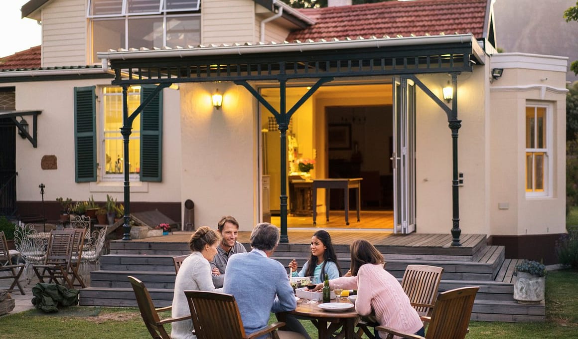 family eating at backyard table XzvkkVn.width