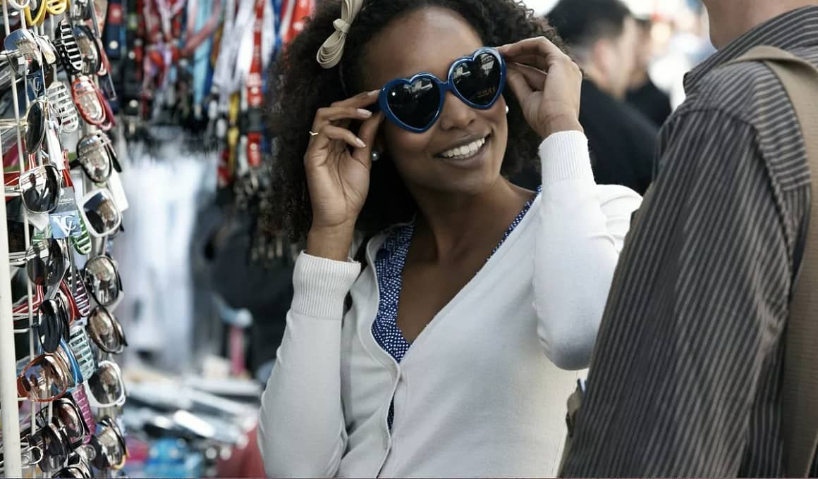 Woman shopping for sunglasses RSnHkOr.width .jpg