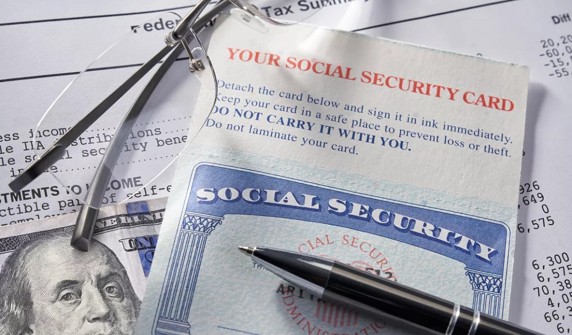 gettyimages social security glasses hundred dollar bill.jpeg