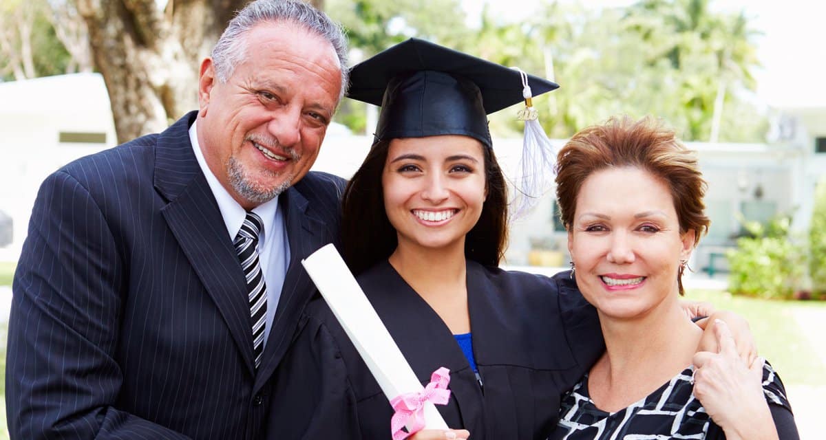 Parents with college student at graduation .width hEWEQM.jpg