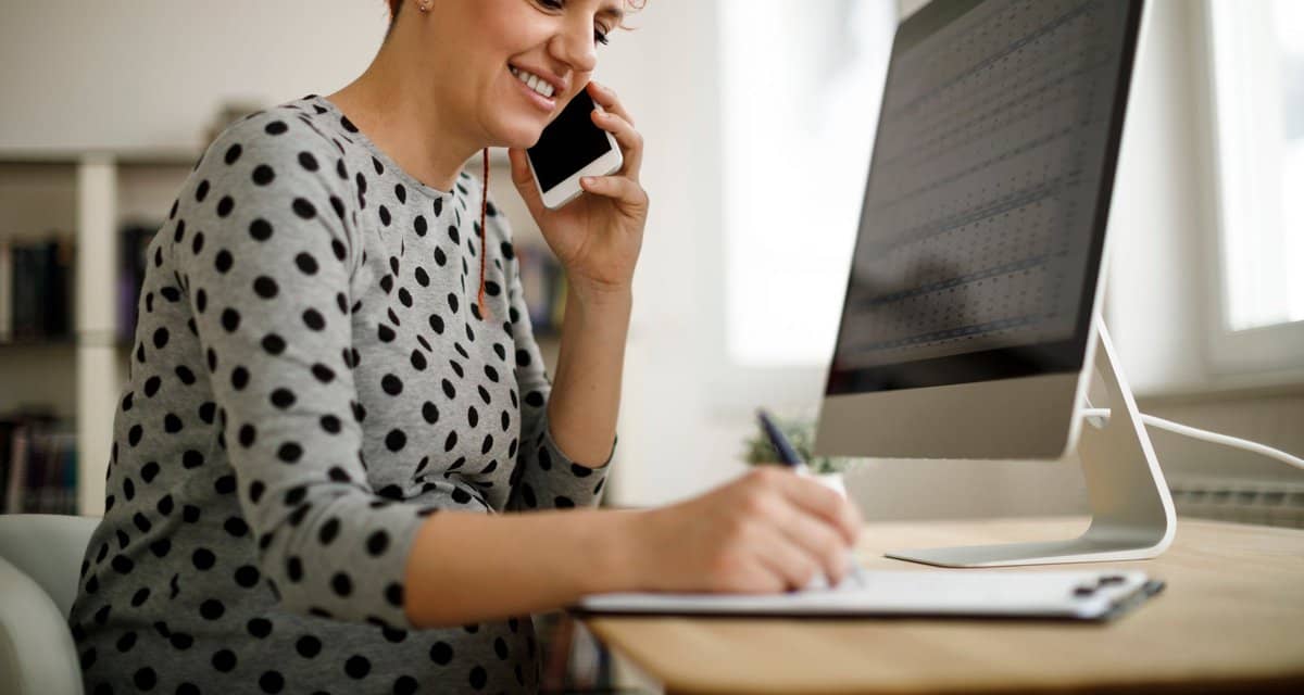 Woman working from home using computer phone .width Zsod.jpg