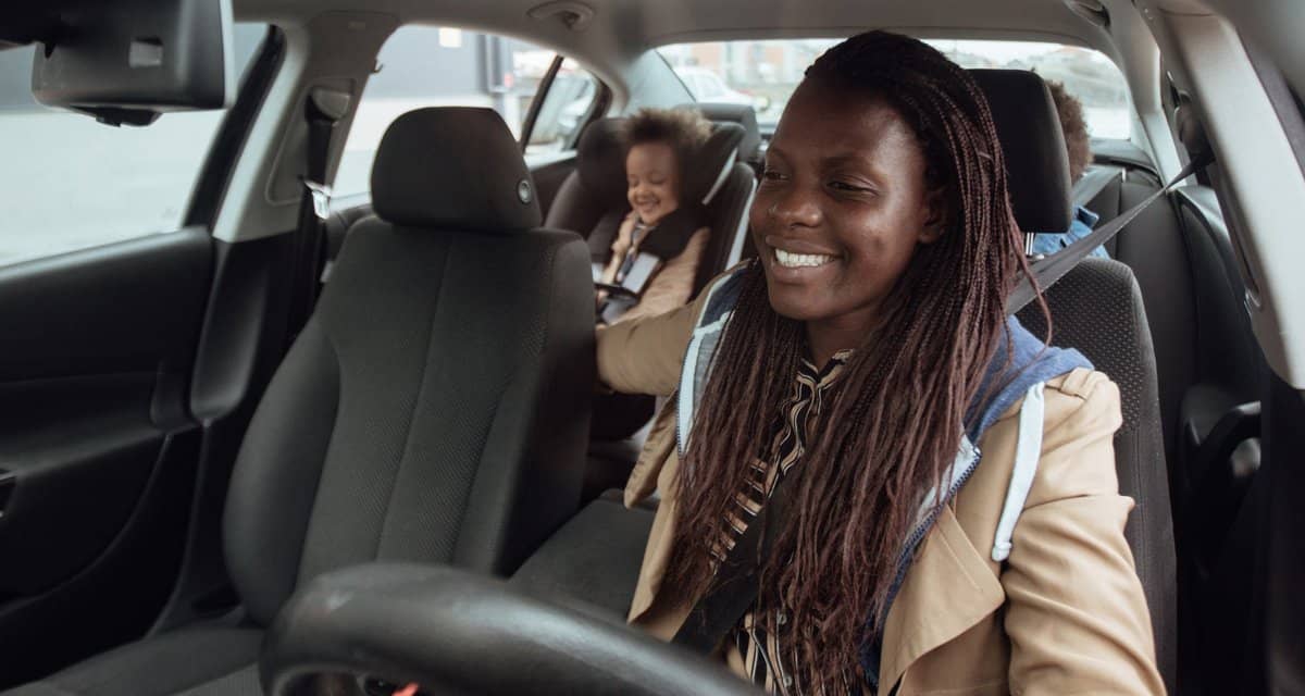 parent driving kids in car llJxxvv.width .jpg