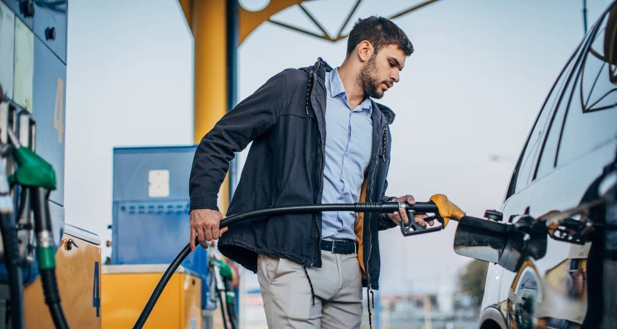 person pumping gas into car WkyEFR.width .jpg