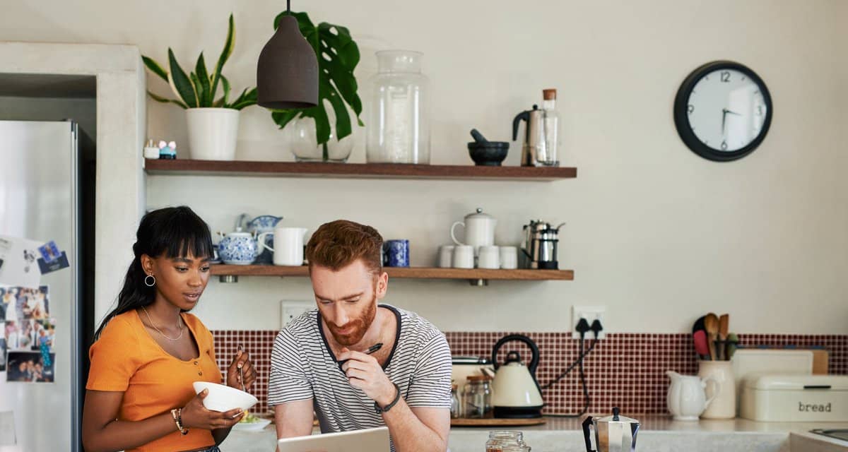 young couple in kitchen on tablet duUFRV.width .jpg