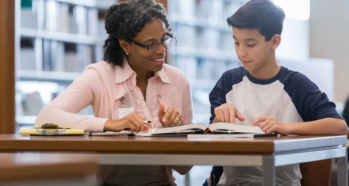 Tutor working with student SRTstck.width .jpg