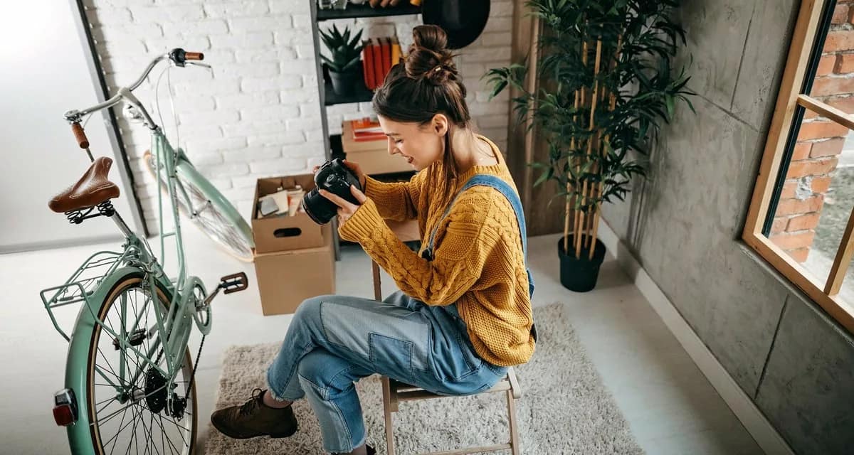woman with camera and bike inside.width .jpg