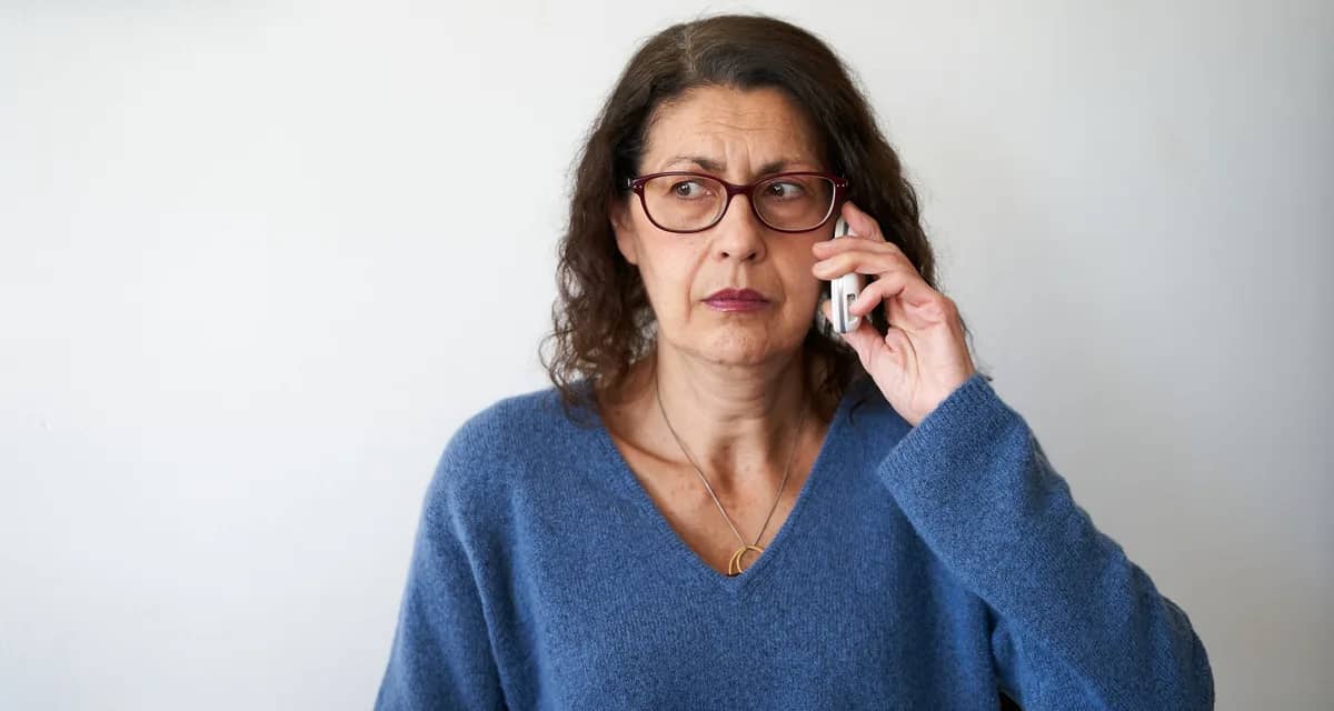 confused person using cell phone.jpg