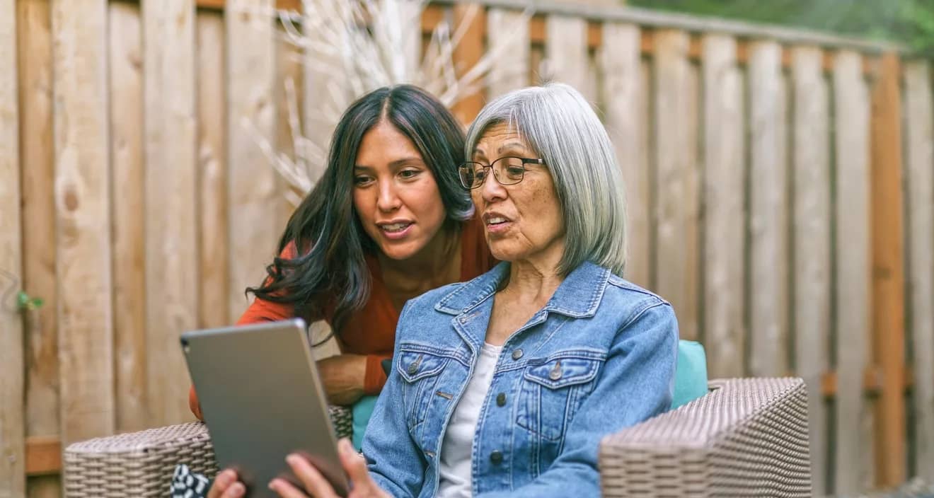 two people looking at tablet together.jpg