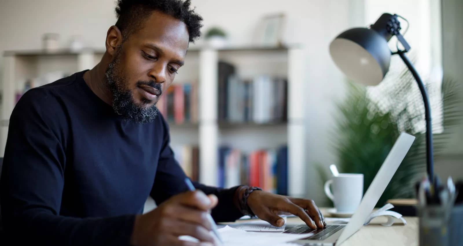 investor reviewing a stock portfolio.jpg