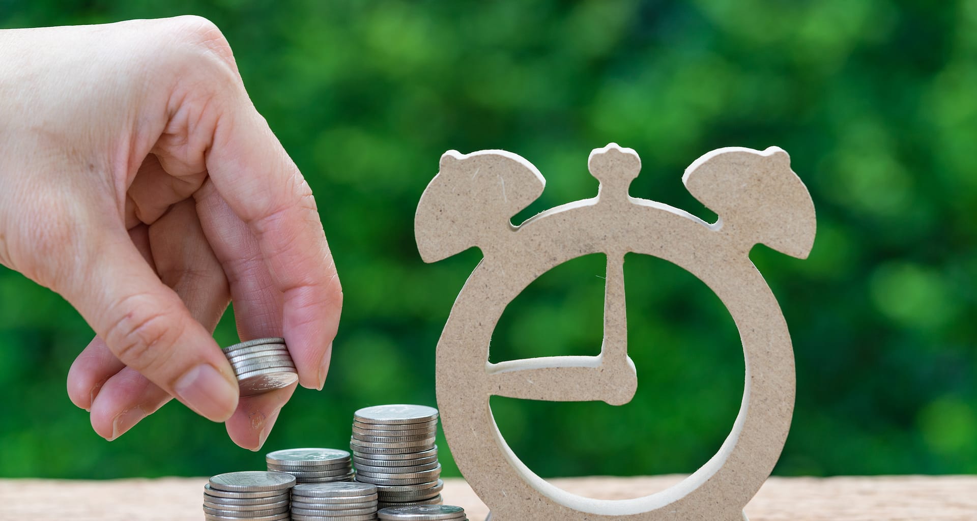 gettyimages coins and clock PfCM