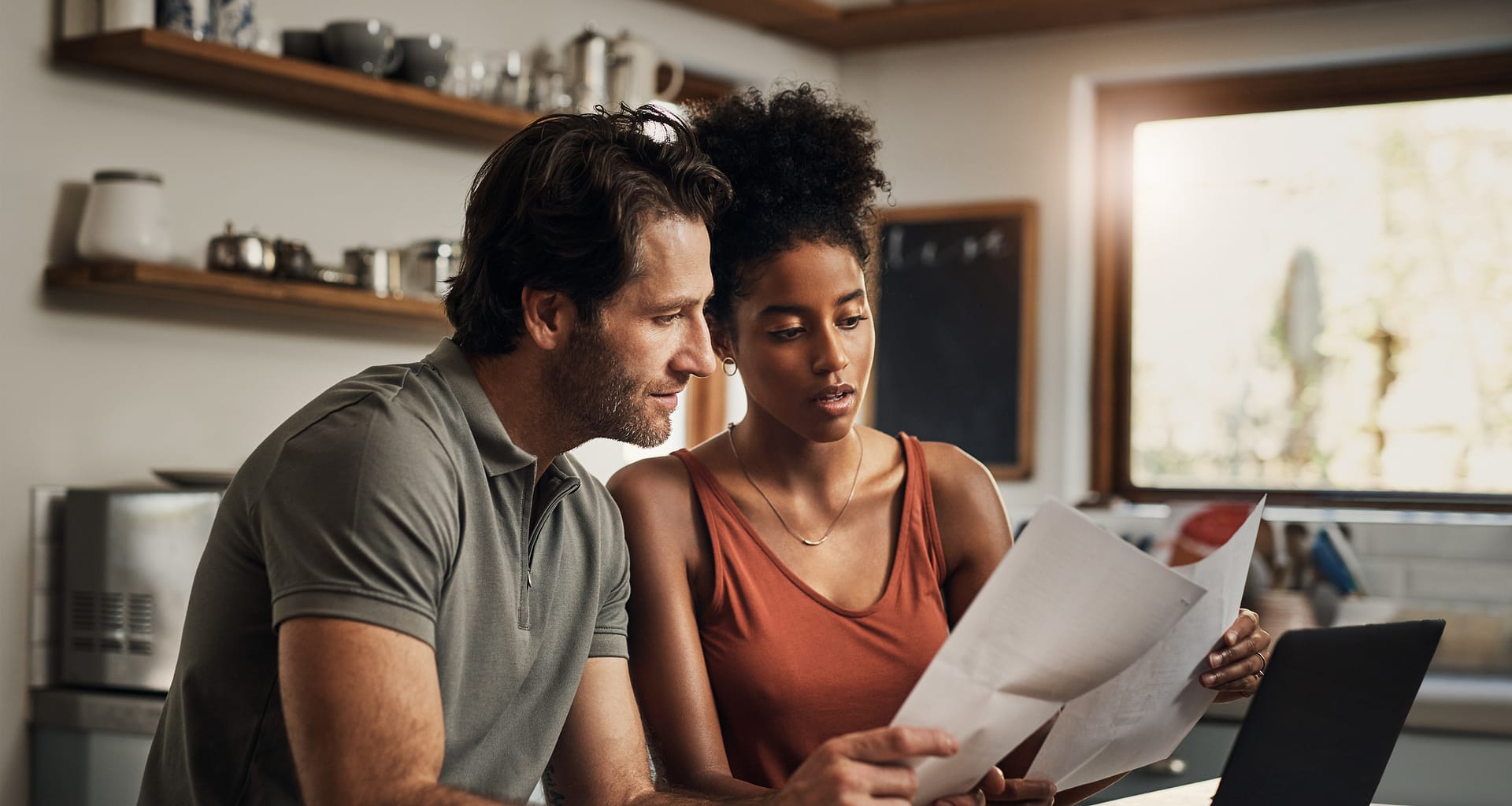couple looking at paperwork together