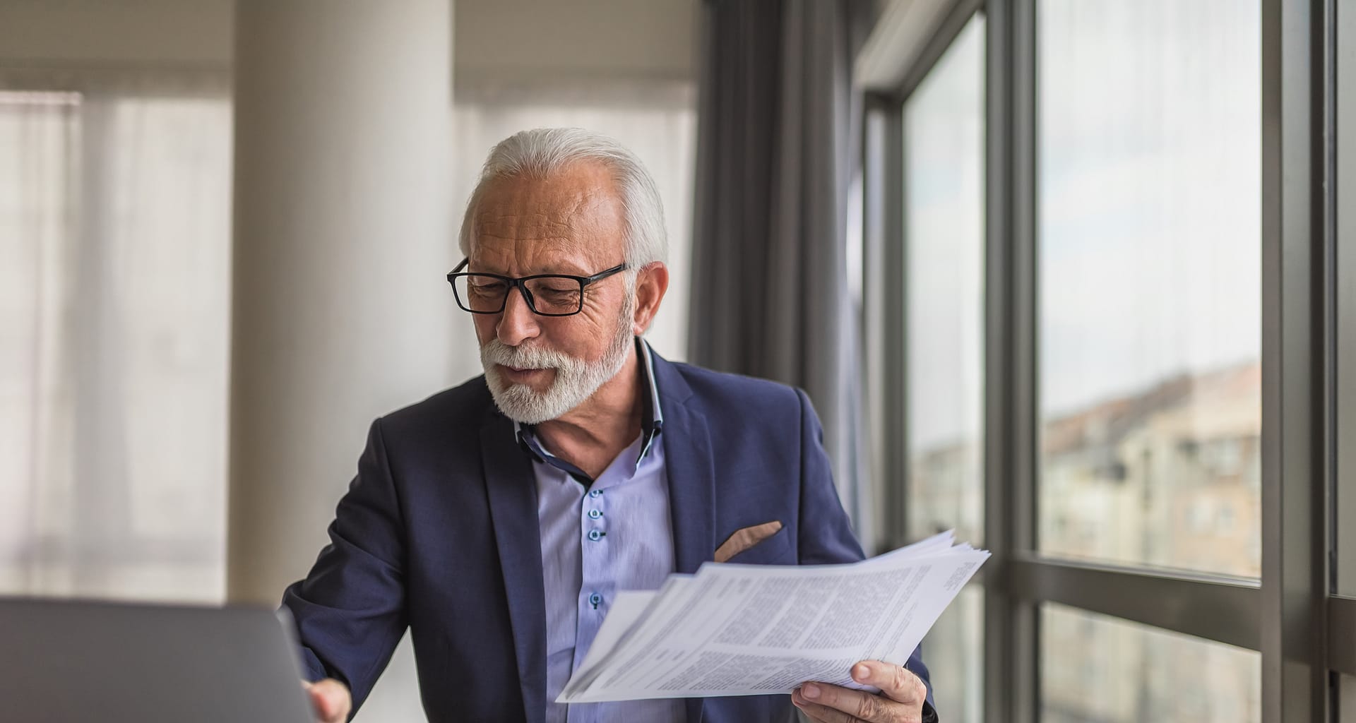 older man professional laptop gettyimages wnN