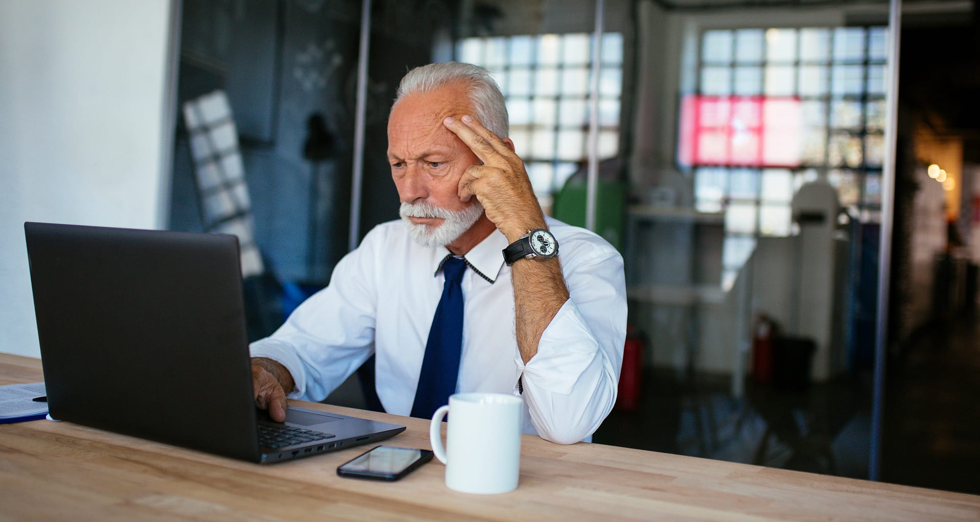 older man laptop serious gettyimages