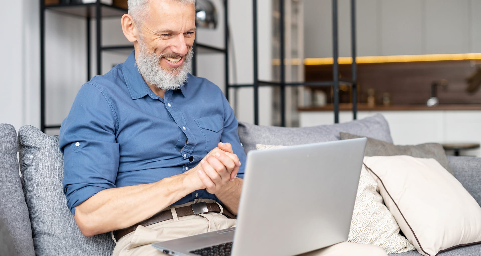 a person looking at a laptop