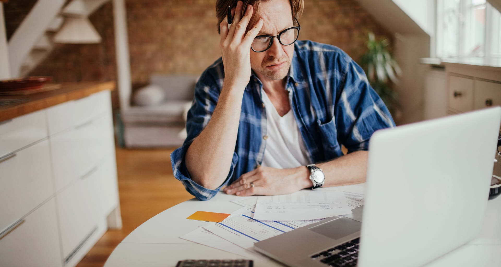 man mid aged laptop stressed