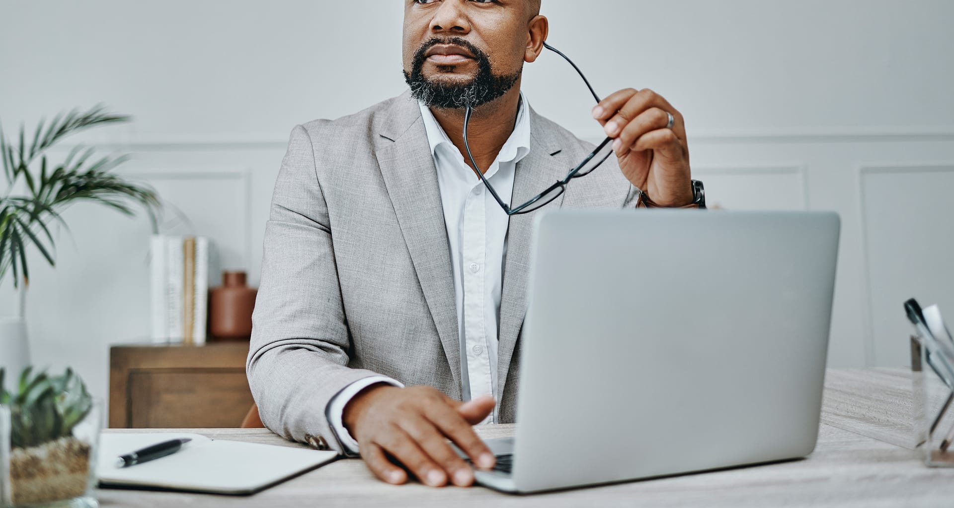 older man laptop in business suit gettyimages