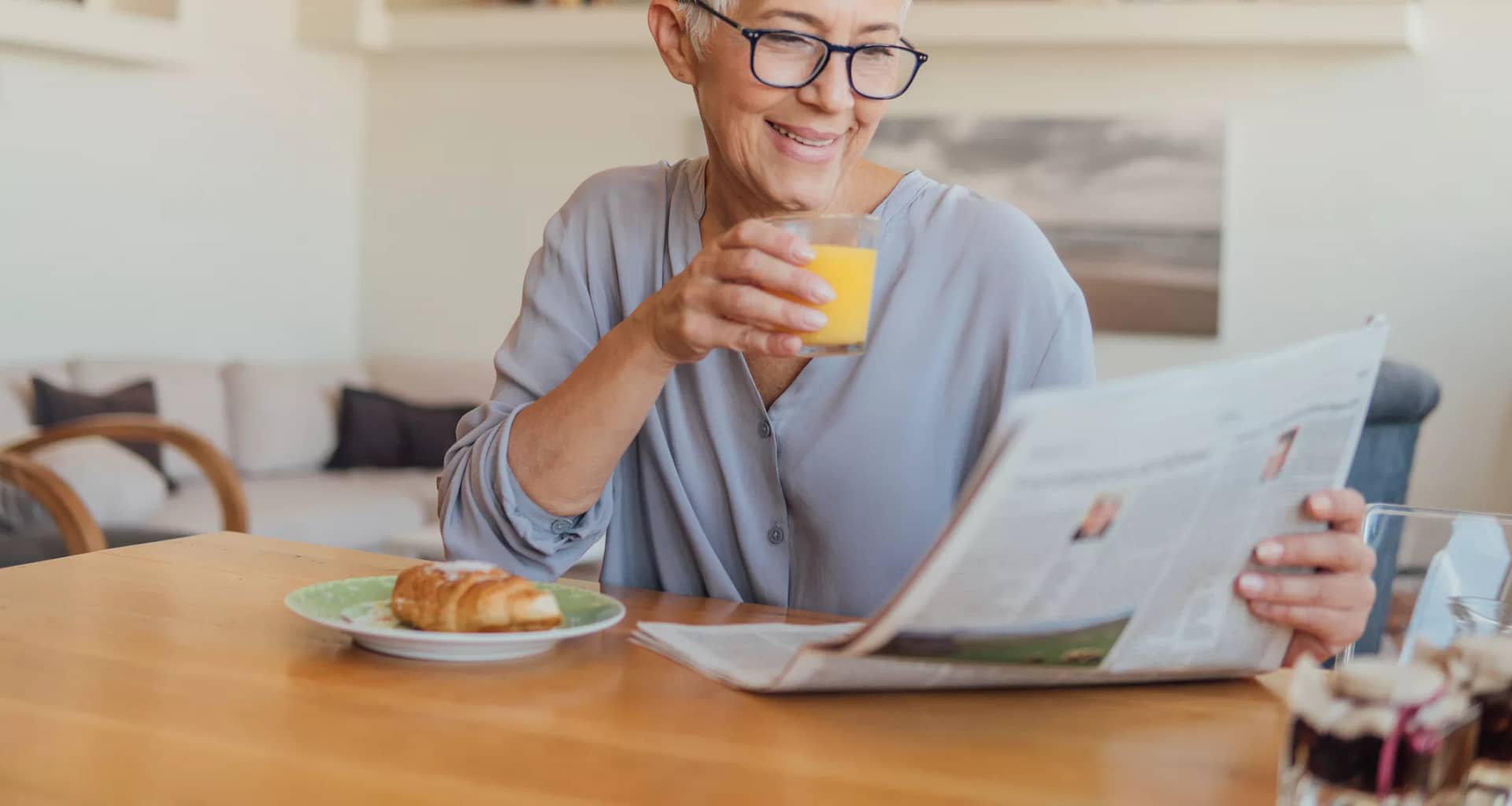older woman newspaper gettyimages .jpg