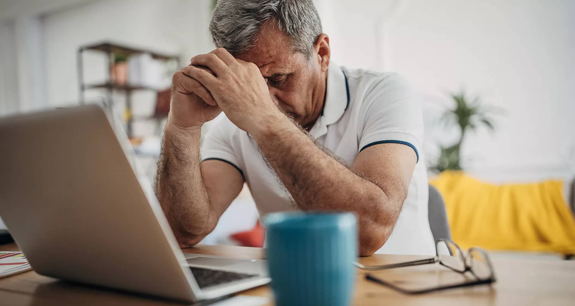 older man laptop upset.jpg