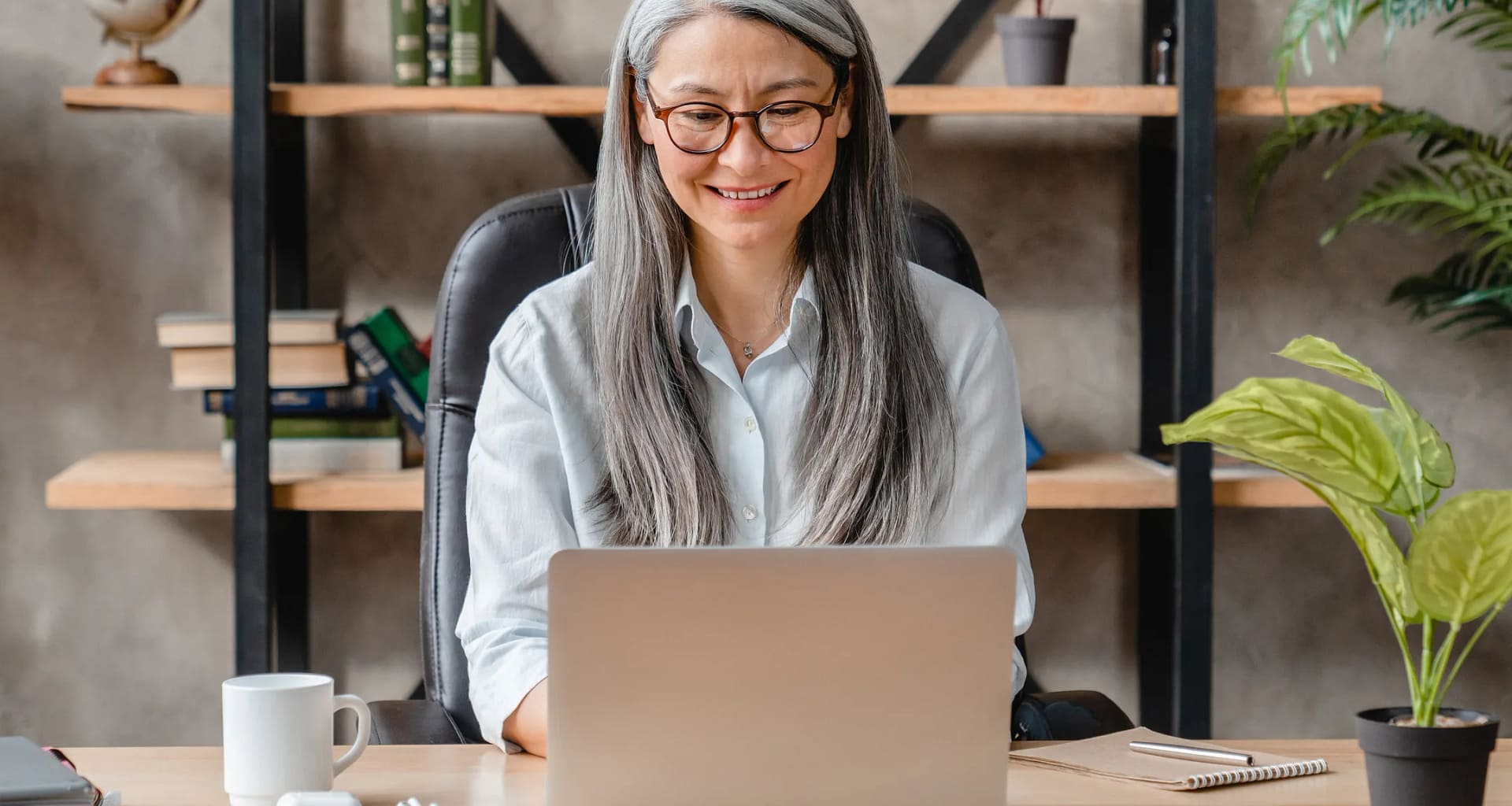 older woman laptop smiling gettyimages .jpg