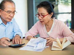 concerned senior asian couple.jpg