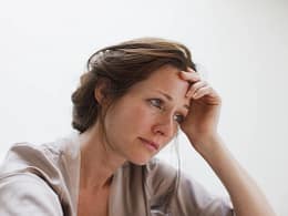 getty sad dismayed unhappy hand on head.jpg