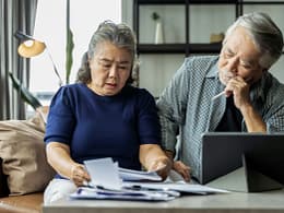 older asian couple stressed.jpg