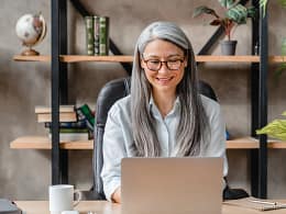 older woman laptop smiling gettyimages .jpg