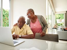 senior couple at laptop gettyimages .jpg
