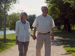 senior couple holding hands outside gettyimages .jpg