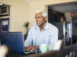 senior man laptop gettyimages .jpg