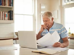 senior man laptop stressed gettyimages .jpg