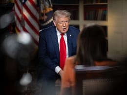 the white house trump sitting for interview flag.jpg