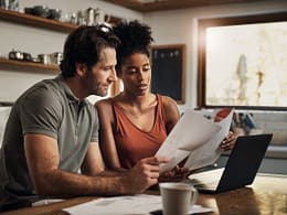 couple looking at financial papers.jpg
