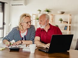 getty images senior couple laptop.jpeg