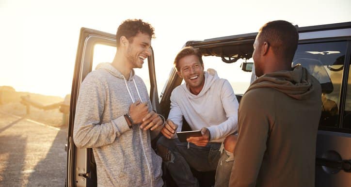 three men in car road trip.width .jpg