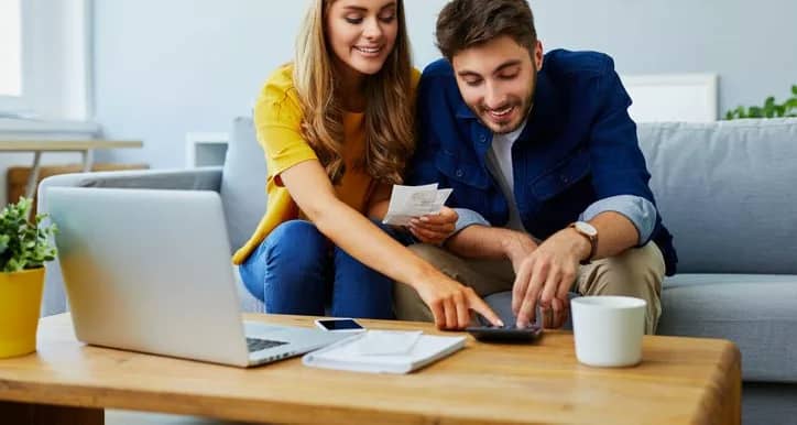 happy couple with calculator wpBfhu.width .jpg