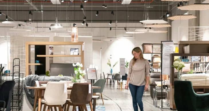woman in furniture store ZMdRBh.width .jpg
