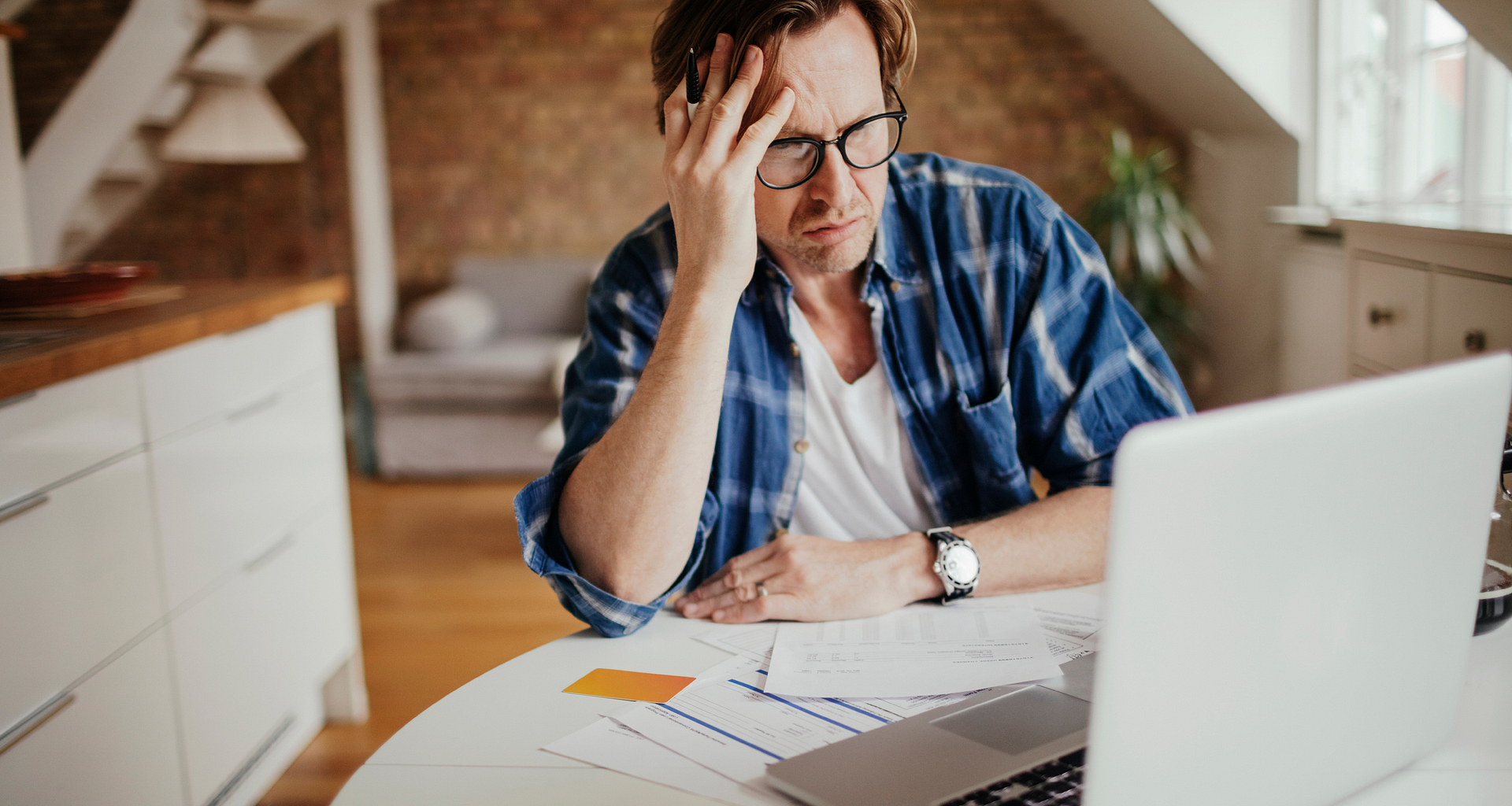 man mid aged laptop stressed