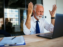 older man laptop annoyed gettyimages