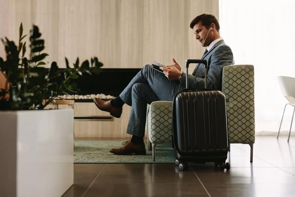 man relaxing in airport lounge TEatp.width .jpg