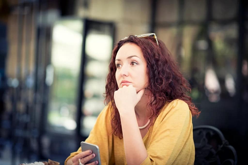 worried person with chin on hand nUBbfc.width .jpg