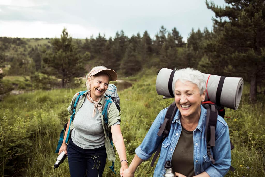 two older people outside hiking.jpg