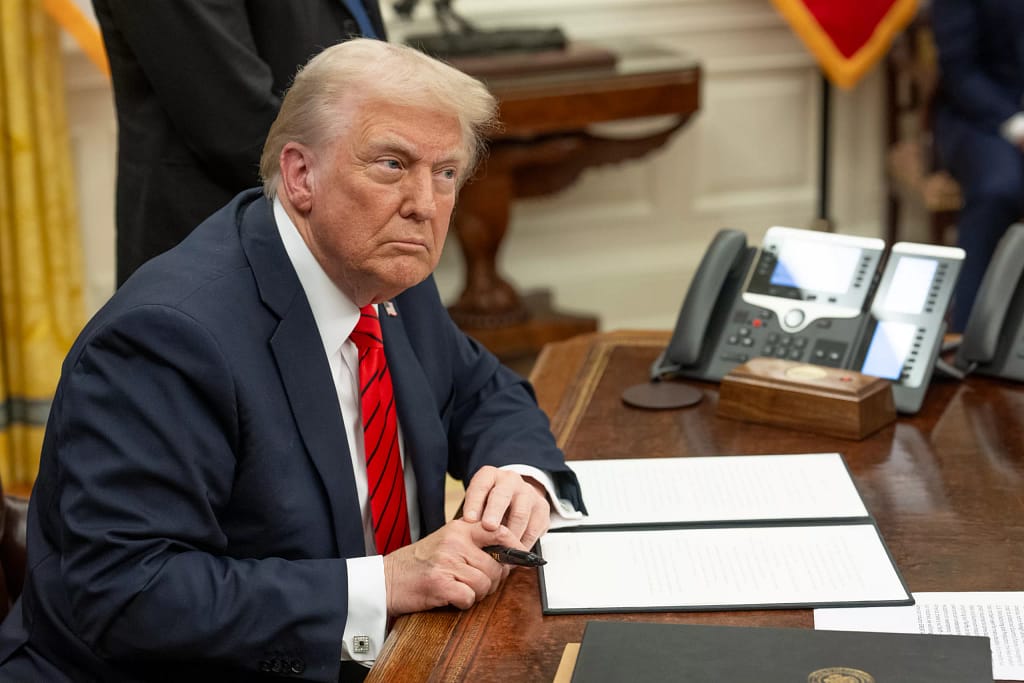 donald trump signs executive order wh photo daniel torok.jpg