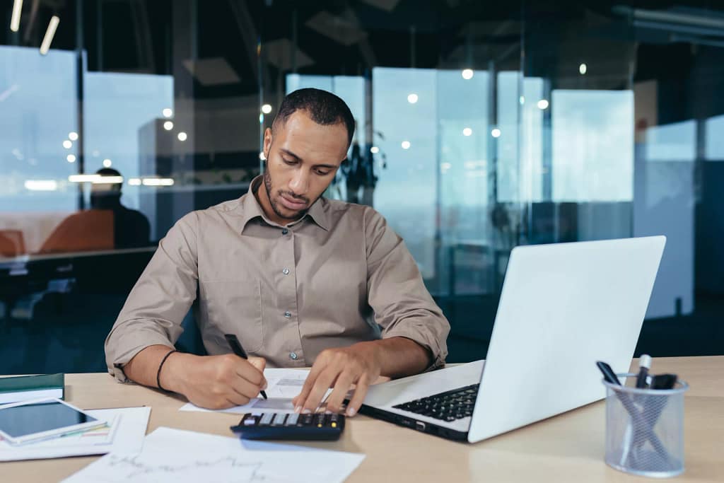 accountant with calculator.jpg