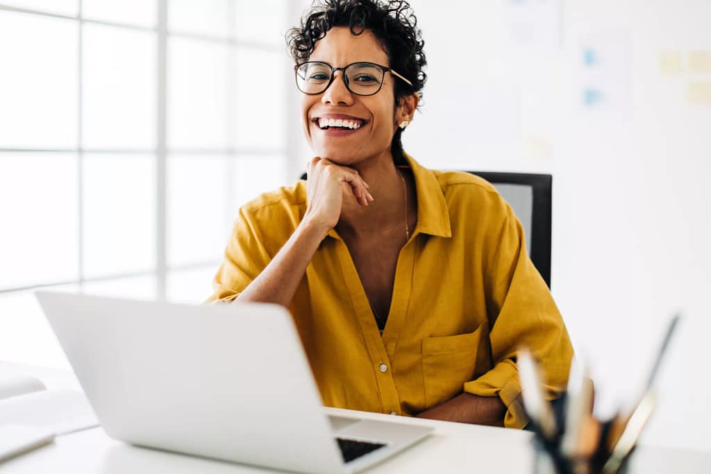 woman s laptop smiling gettyimages .jpg