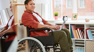 getty wheelchair smiling j59nSO