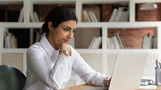 woman fairly young at laptop gettyimages Qhcleq