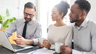 couple consults with advisor JPIfaa
