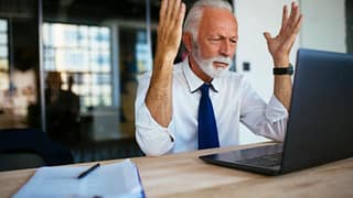 older man laptop annoyed gettyimages DOThx