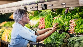 senior woman produce aisle gettyimages TsEf